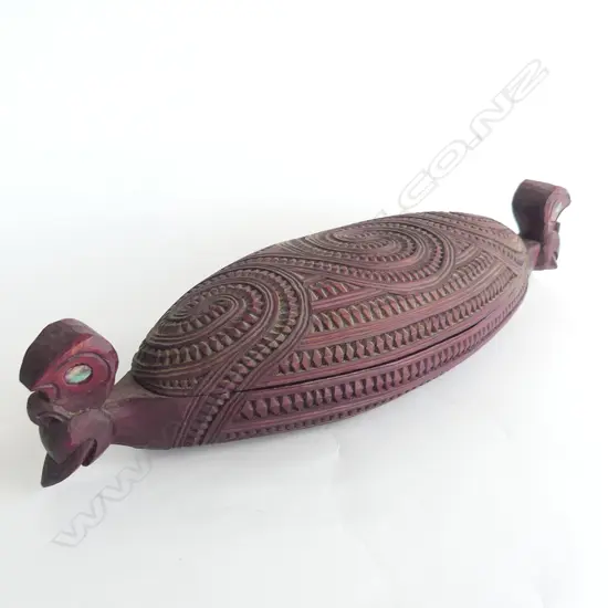 A c.1980s Māori carved lidded waka huia,